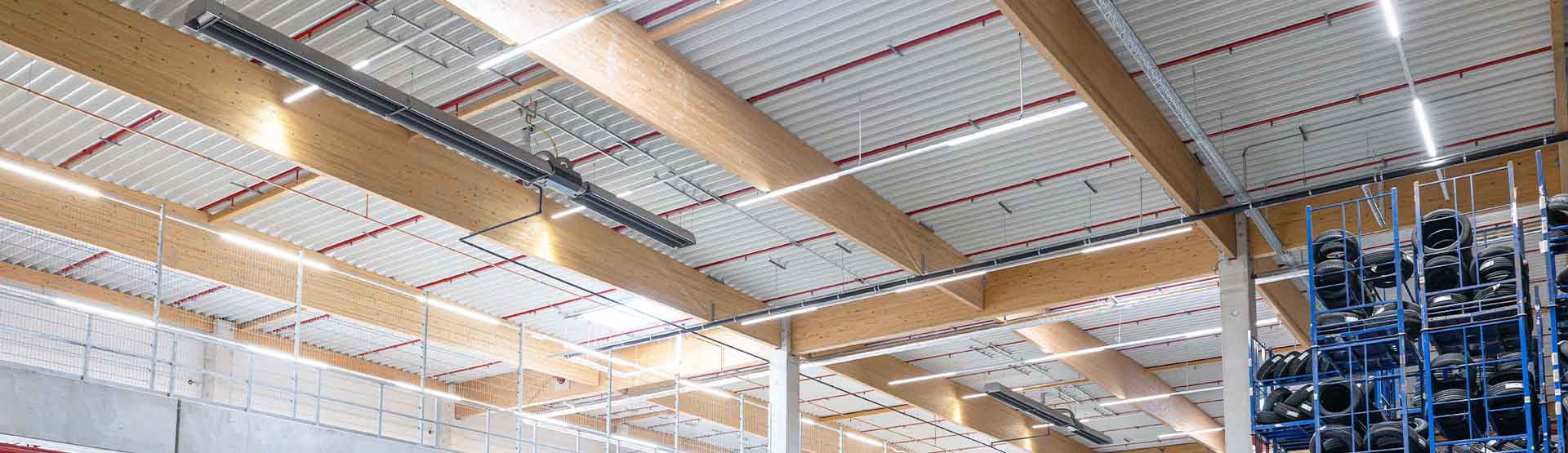 Schwank infrared radiant heaters under the roof of a logistics hall